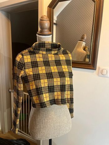 Pull col roulé à carreaux