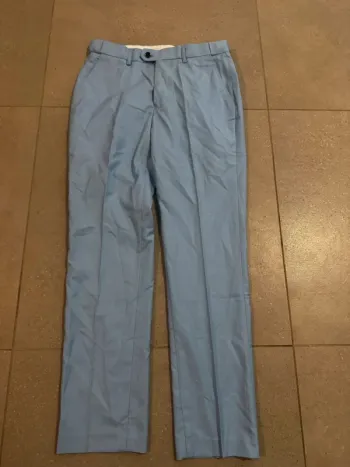 Pantalon bleu clair taille XS, très bon état, 40x100cm