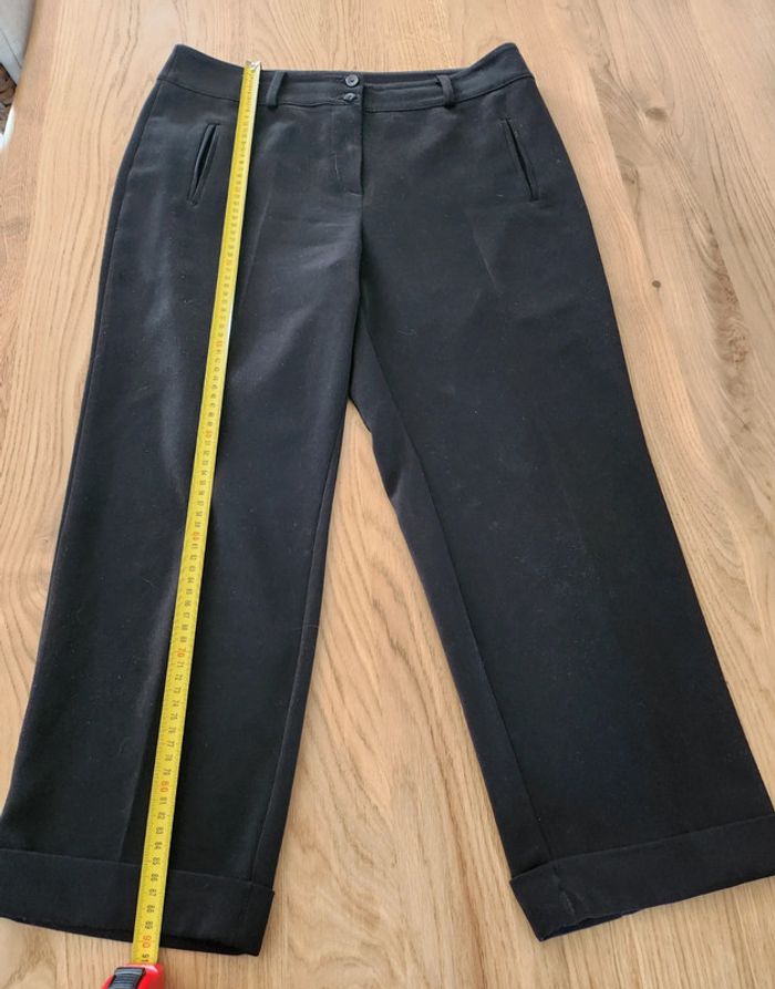 Pantalon noir a revers sur le bas en très bon état Armand Thiery taille XL 42 - photo numéro 4