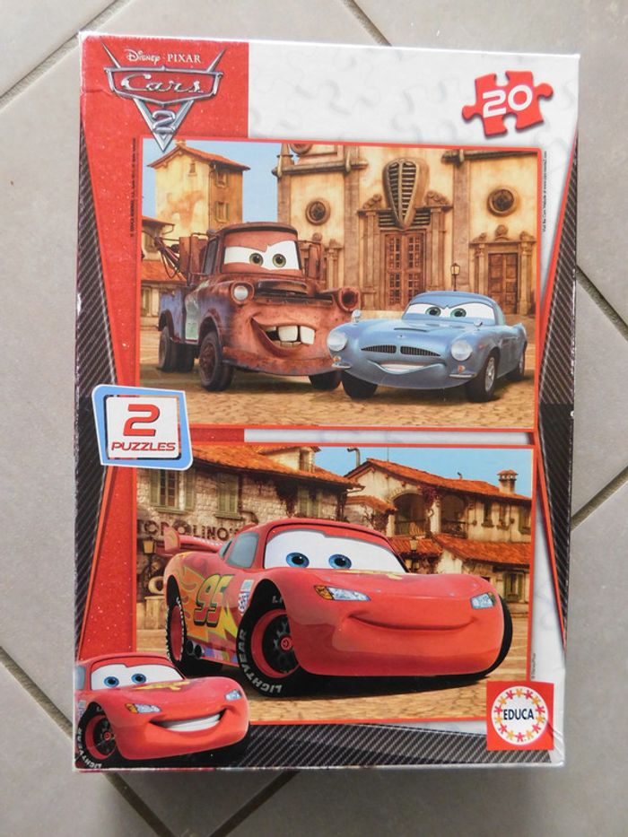 2 Puzzles cars 20 pièces très bon état Educa disney pixar