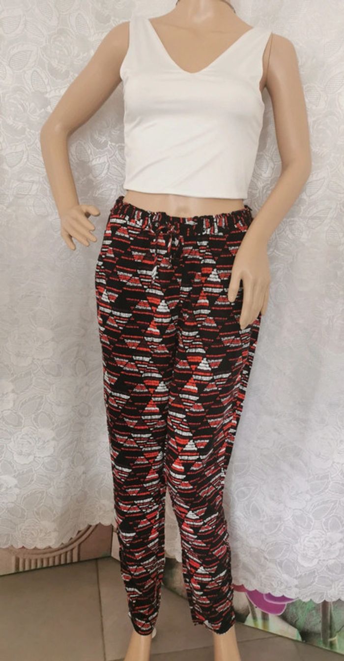Pantalon. Noir-rouge-blanc. Taille 38. Cache Cache