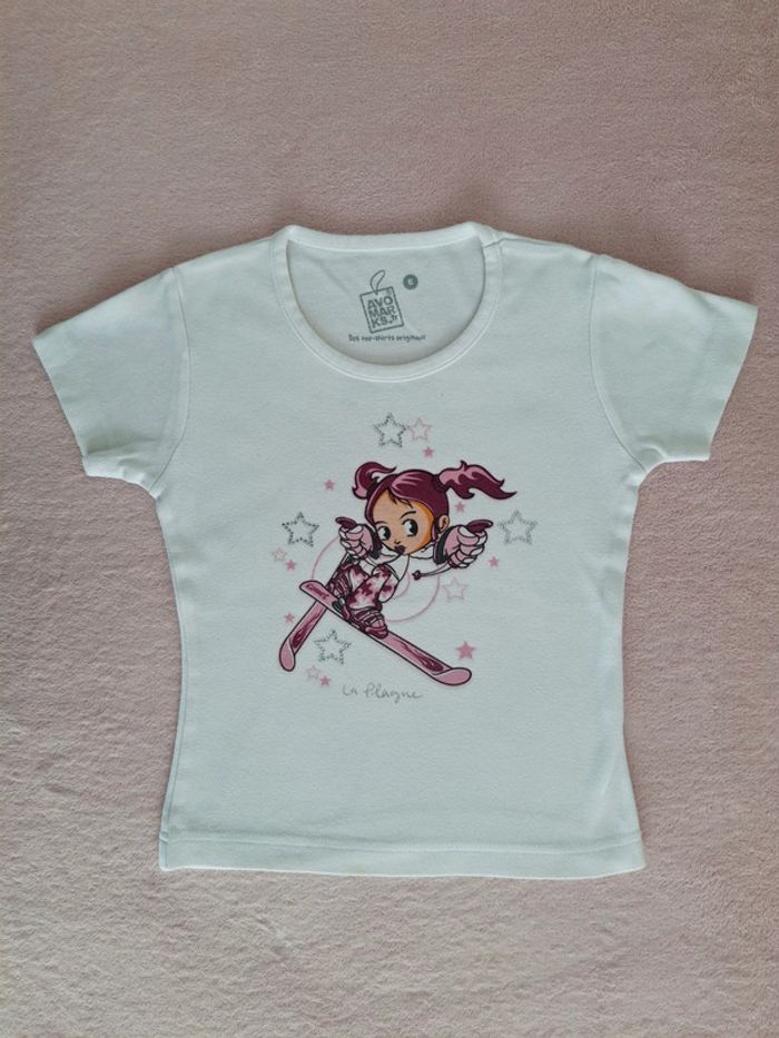 T-shirt manches courtes 6 ans Avomarks blanc motif skieuse et étoiles en strass