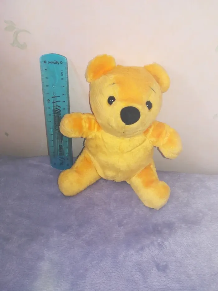 Petit doudou Winnie l'ourson - photo numéro 4