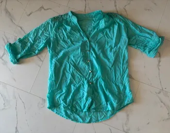 Beau chemisier bleu turquoise T. 44 femme TBE