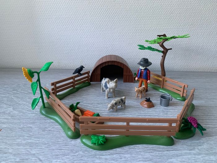 Enclos et éleveur de cochons Playmobil 5122