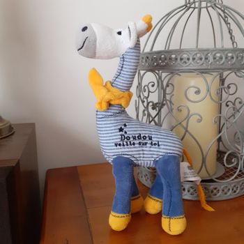 Doudou Girafe avec grelot *Tape à  l'œil