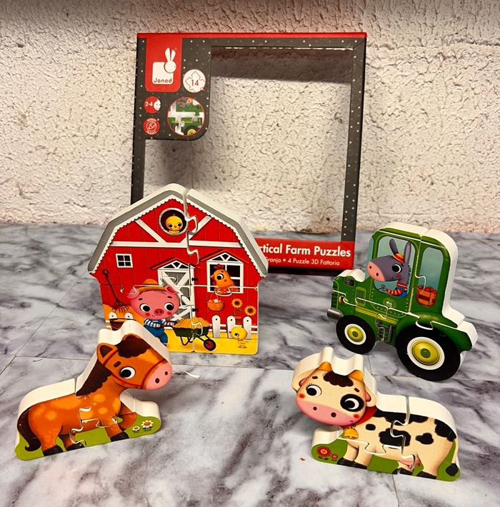 4 puzzles nous en 3D Janod - photo numéro 1