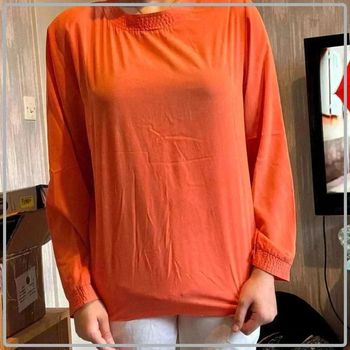 Haut  taille  44 marque Gaston jaunet