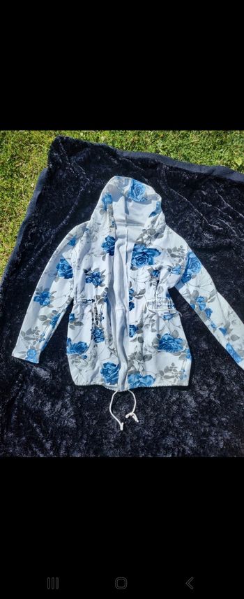 Veste blanche à fleur