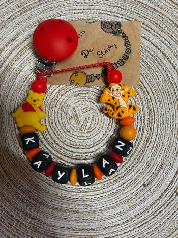 Attache tétine Winnie l’ourson