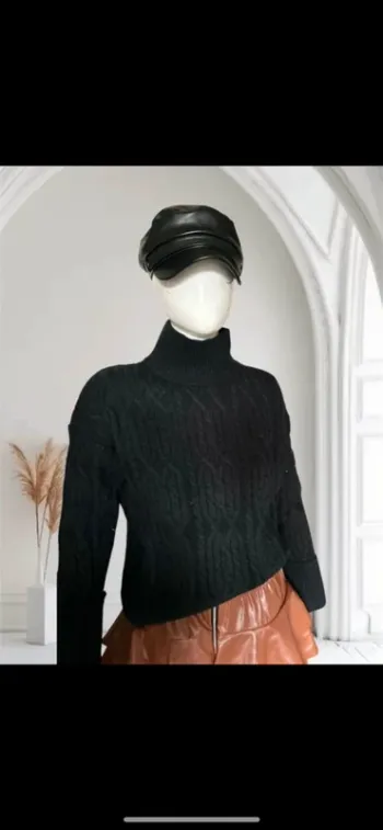 Pull torsadé noir