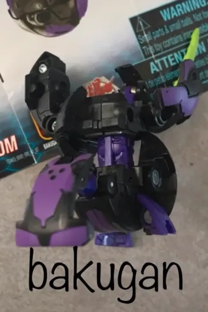 jouet bakugan darkus cyndeous noir et violet avec notice de remontage