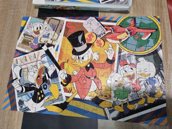 Puzzle complet 104 pièces duck tales avec boite abimée