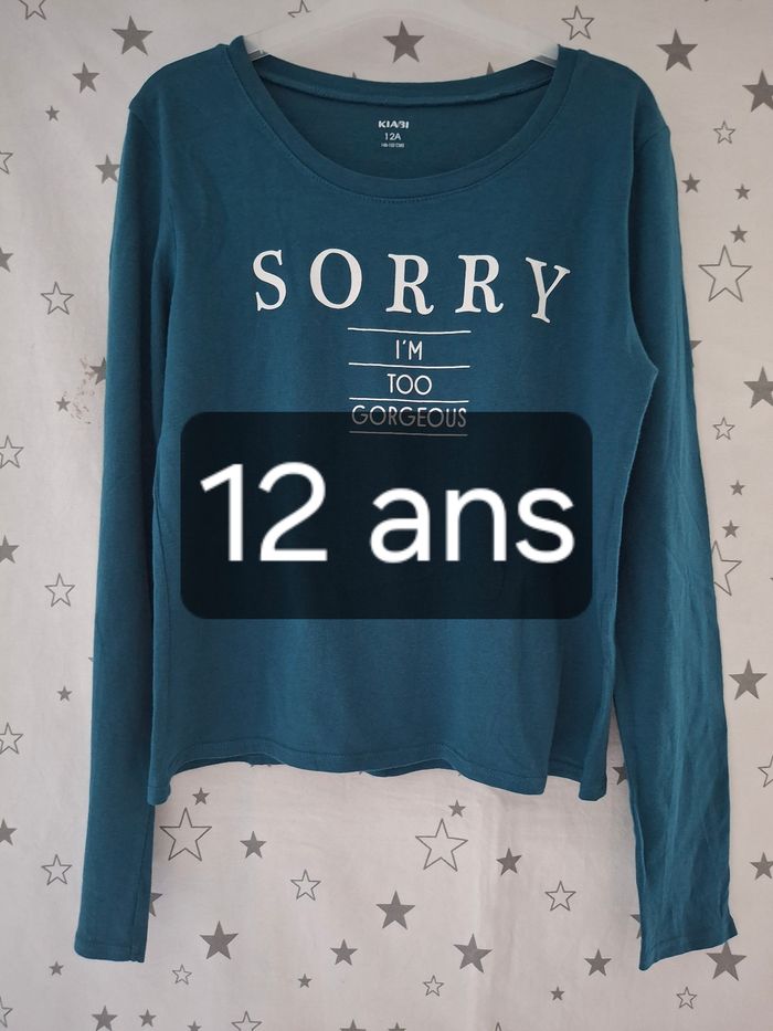 Tee-shirt bleu roi avec Inscription Sorry 12 ans Kiabi
Très bon état ni trous ni tache