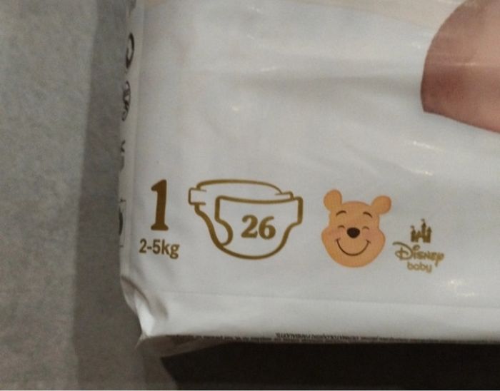 Deux paquets de couches Huggies taille 1 - photo numéro 2