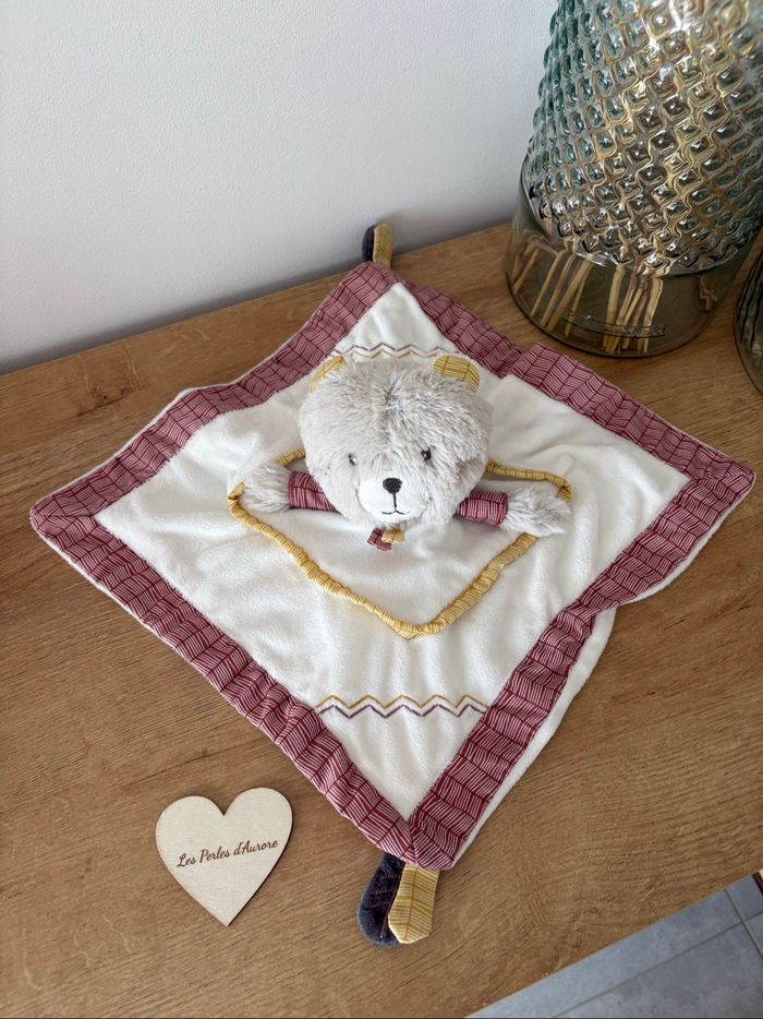 Doudou ours grelot