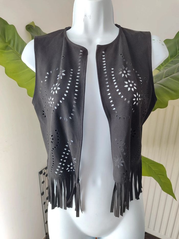 Veste sans manches à franges