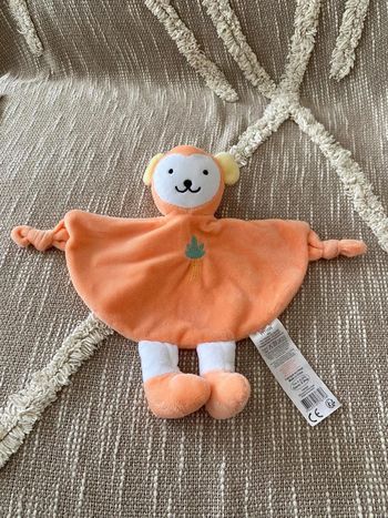 Peluche doudou plat 25cm Tom et kiddy singe blanc et orange très bon état