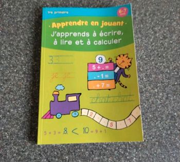 Apprendre en jouant livre d'exercice 1ere primaire .