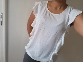 Joli haut à pois taille 42
