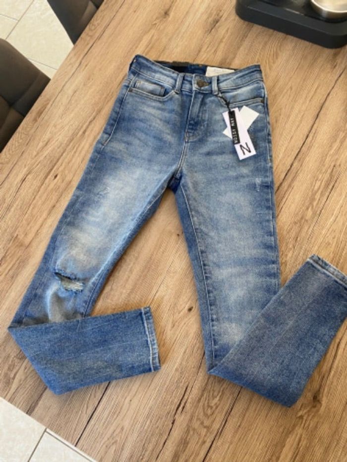 Jeans taille haute troué bleu