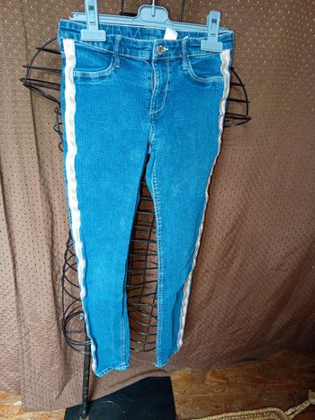 Jeans au bords rose taille 10/11ans