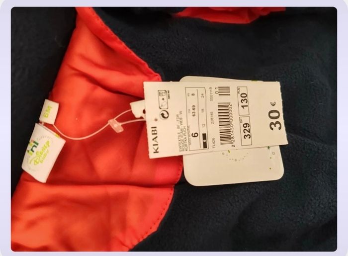 Manteau neuf 6mois - photo numéro 2