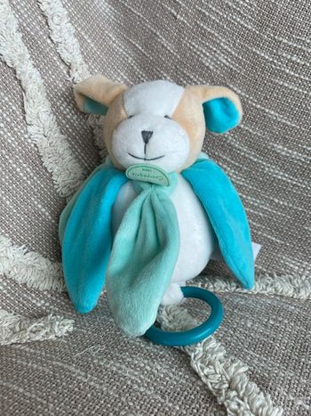 Peluche musical 18cm doudou et compagnie chien bleu beige et blanc très bon état