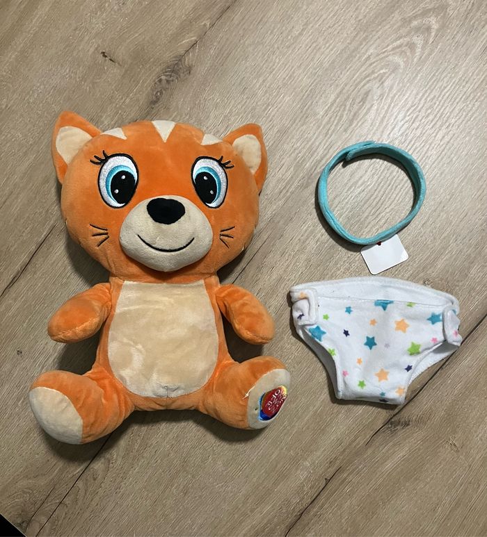 Peluche bébé avec couche