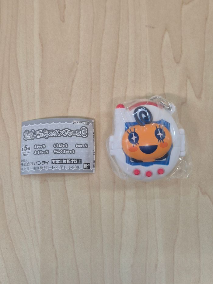 Gashapon Tamagotchi "Swing case" : Memetchi