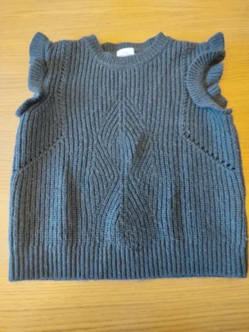 Pull sans manches tape à l'oeil