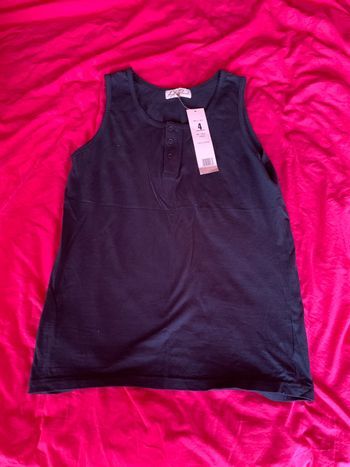 débardeur neuf  coton marine taille 4