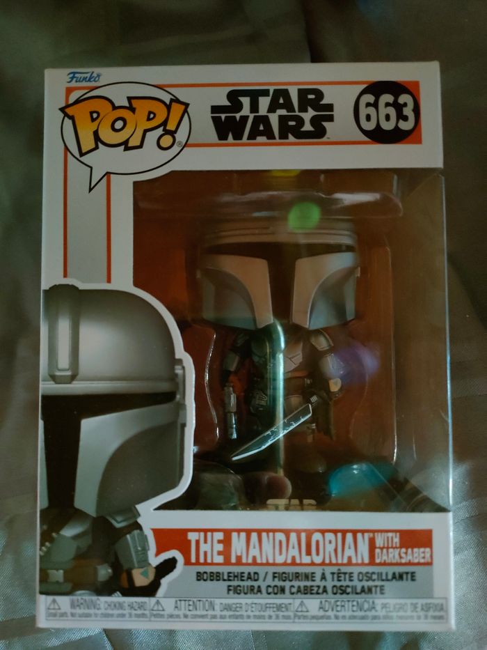 Funko Pop star wars the Mandolarian with dark saber