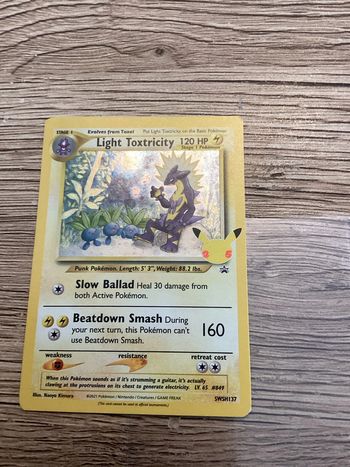 carte Pokémon swsh137 light toxtricity célébration 25ans anglais ANG