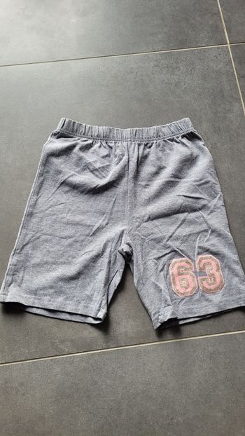 Short fille pulcino 9/10 ans