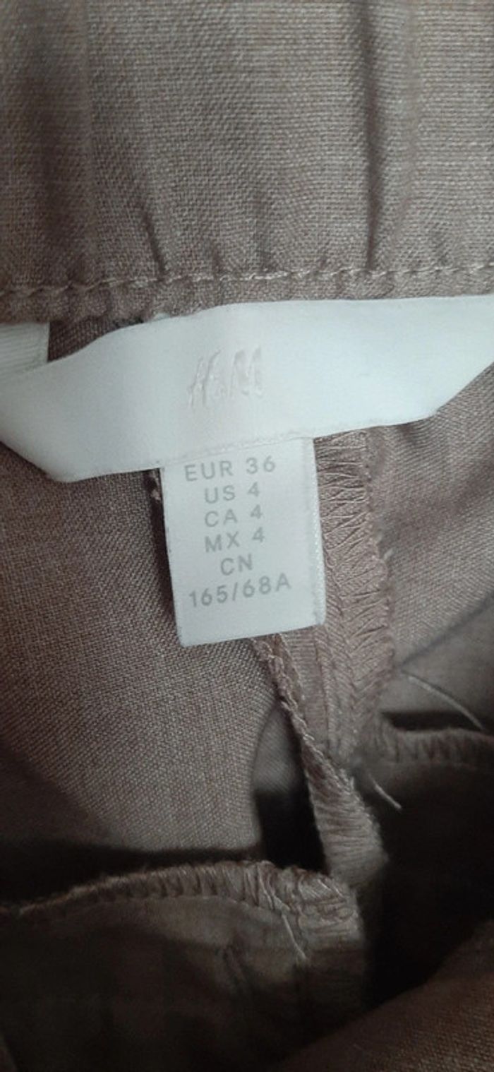 Pantalon femme avec des plis - photo numéro 2