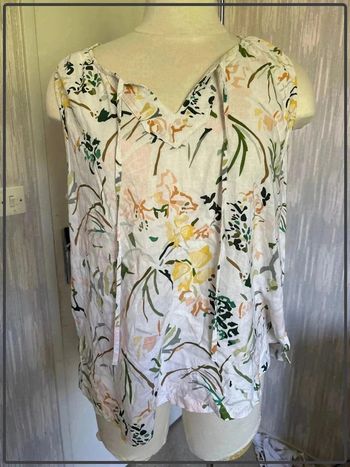 Très jolie blouse taille 42 *