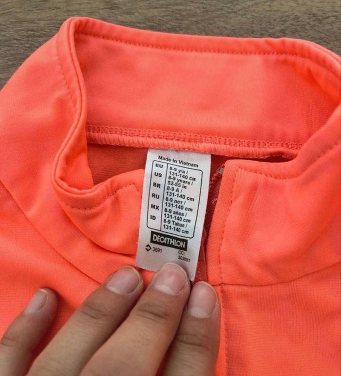 Gilet à Tirette de sport décathlon taille 8/9 ans (131/140cm) Tres bon état Couleur orange - photo numéro 2