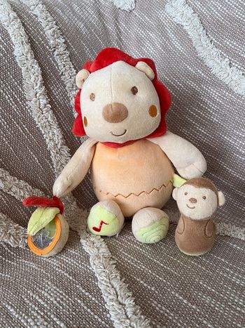 Peluche doudou 29cm sucre d’orge lion orange et rouge très bon état