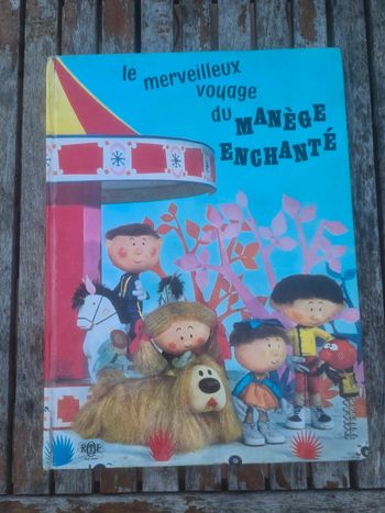 Grand livre le merveilleux voyage du manege enchanté 1965