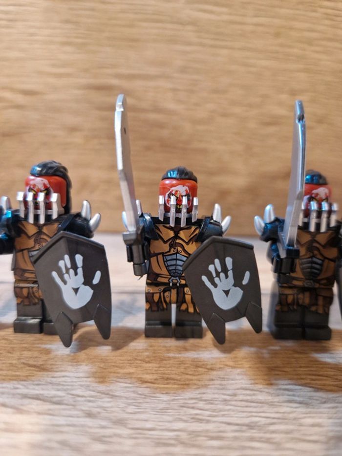 Figurines type lego 4 guerriers orcs seigneur des anneaux - photo numéro 2