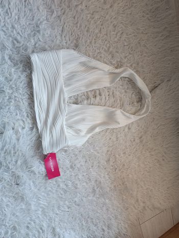 Petit top neuf taille L