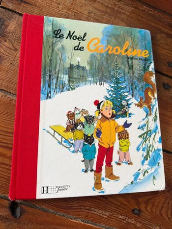Moyen 1 - Livre édition limitée reliure rouge Le Noël de Caroline Pierre Probst bd