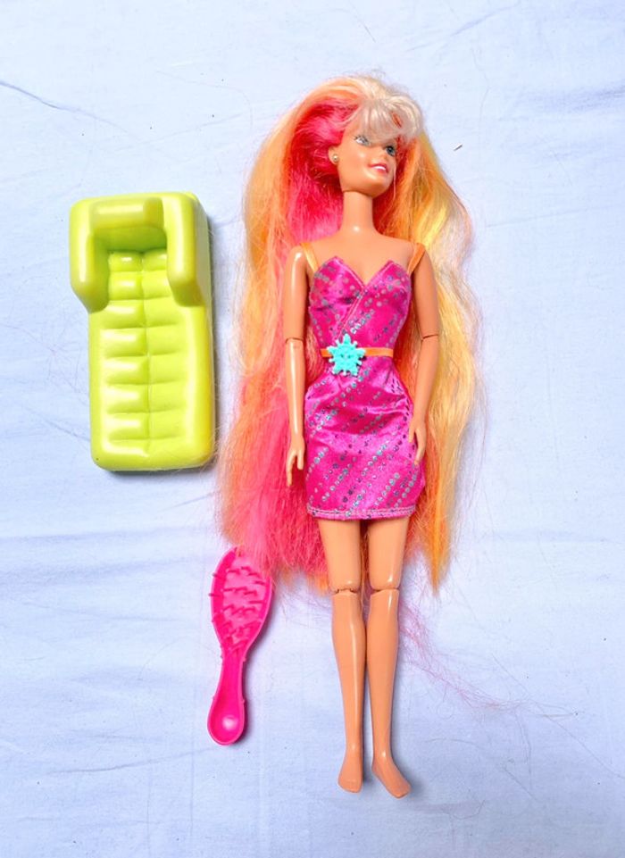 Poupée barbie hula hair