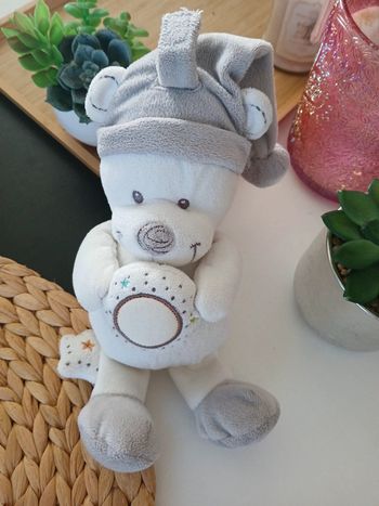 Péluche/doudou musicale à accrocher Comme Neuf🌿🎁