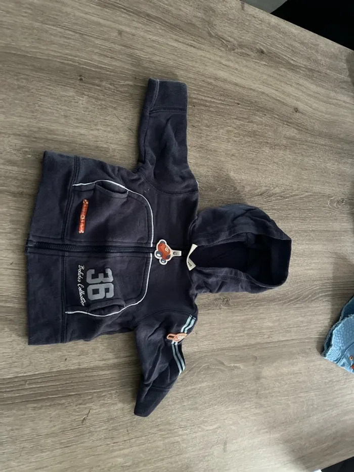 Gilet capuche