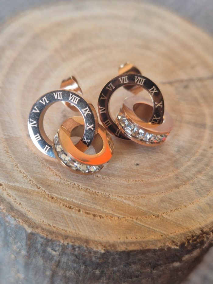 Magnifique boucle d'oreilles acier brillante