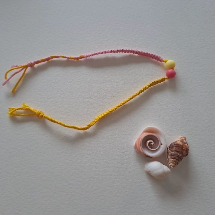 (Réduction) Bracelet avec perles jaunes et fuchsia - photo numéro 3