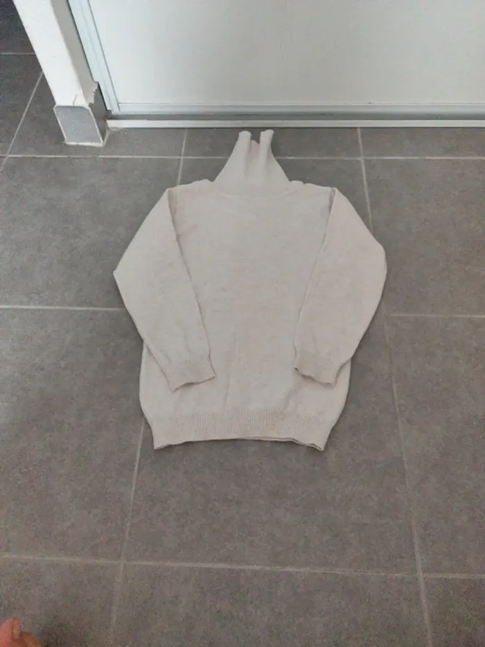 Pull col roulé