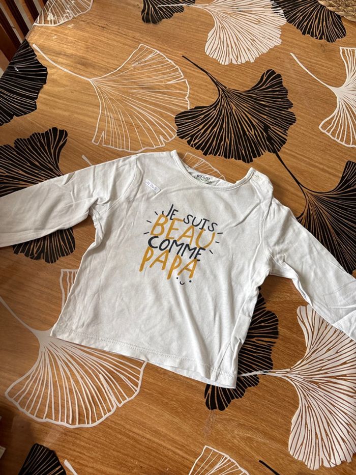 Haut je suis beau comme papa